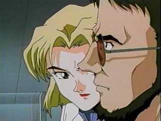 Ritsuko and Gendo discuss what to do with young Shinji.