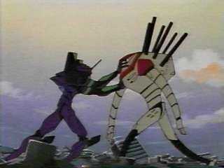 Shinji, in EVA-01 tries to stop the JA (Jet Alone).